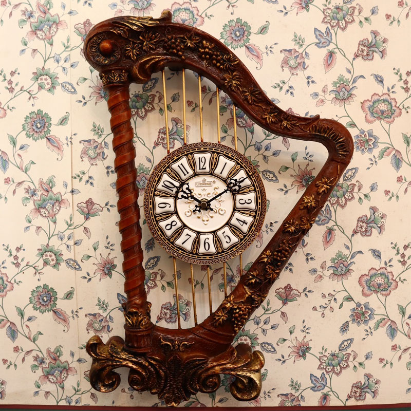 グランドハープ型のおしゃれな壁掛け時計　CE-645M